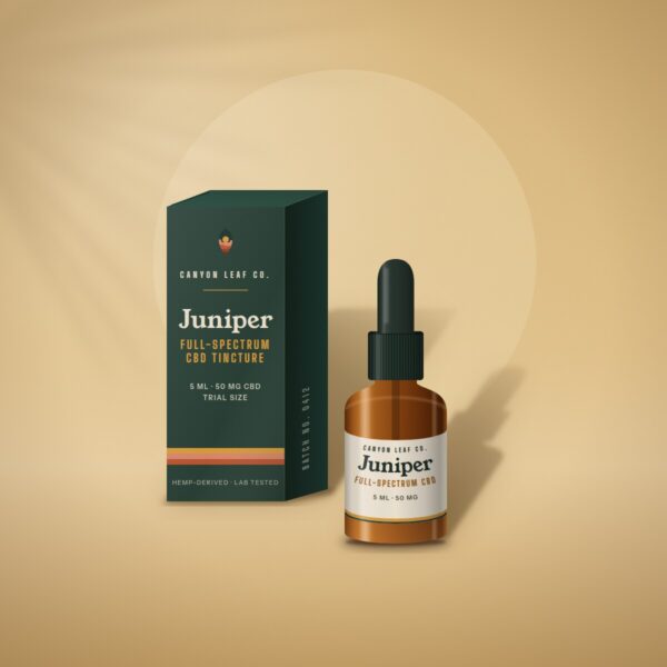 Juniper full-spectrum CBD tincture in a 5 ml amber dropper bottle beside its green carton